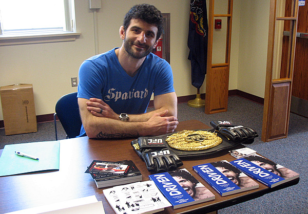 Charlie Brenneman with his books